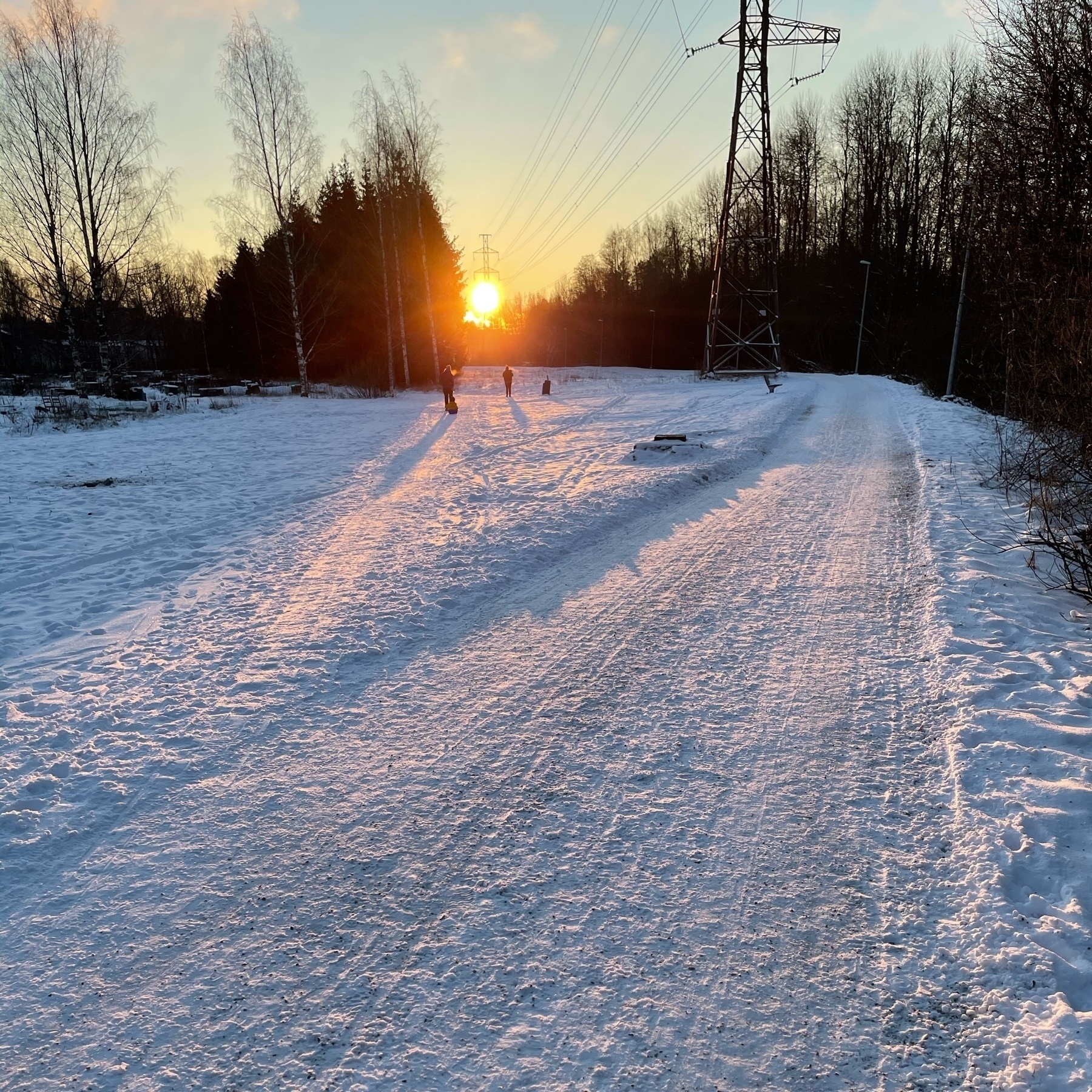 sun, snow, footprints on snow