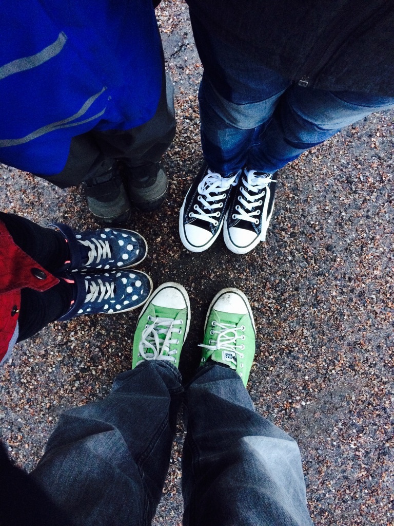 shoes in a circle, green converse, black converse, polka dot sneakers, kids’ winter boots