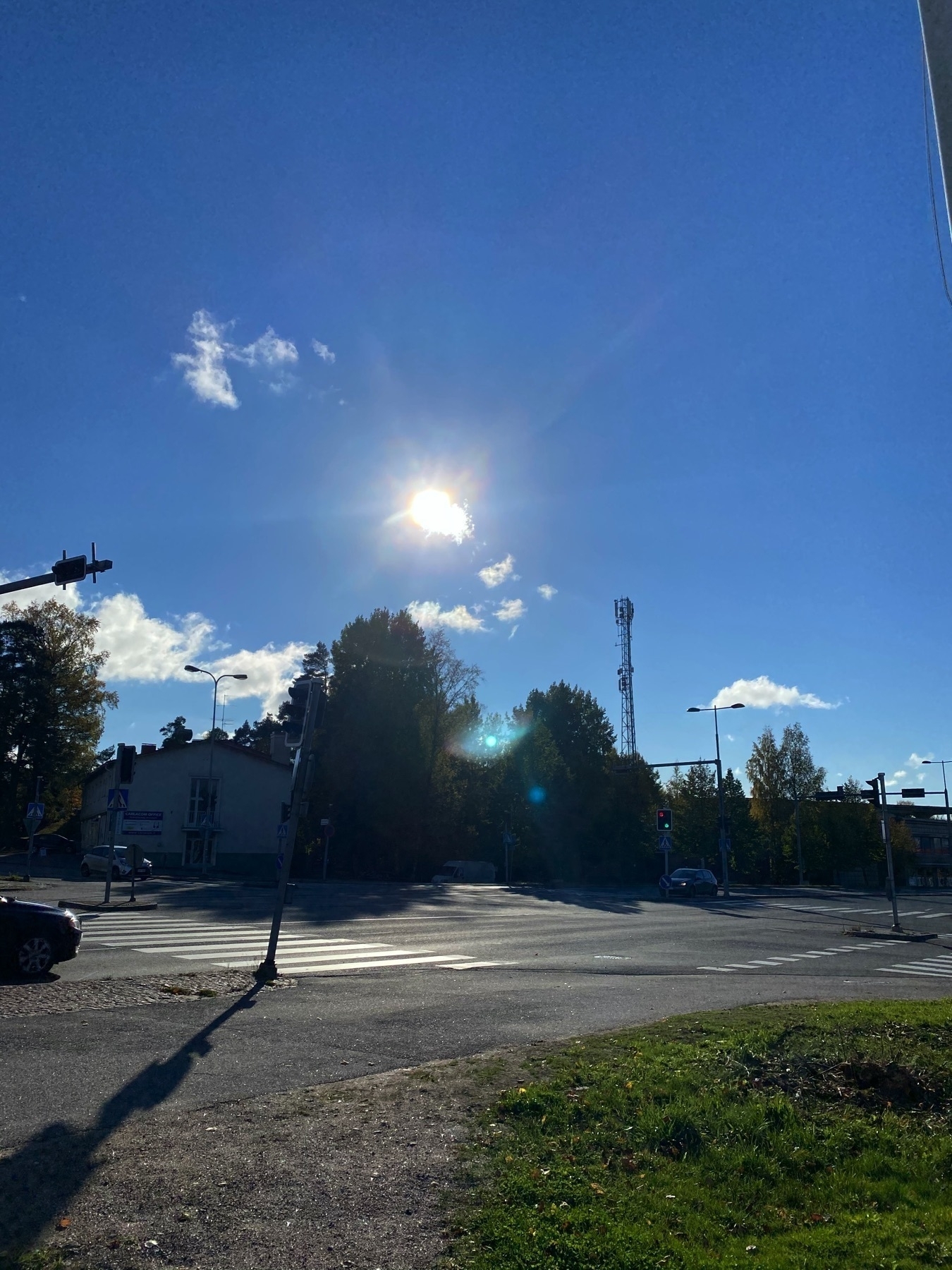 Espoo Finland at 14:02 today, sun, asphalt, long shadows