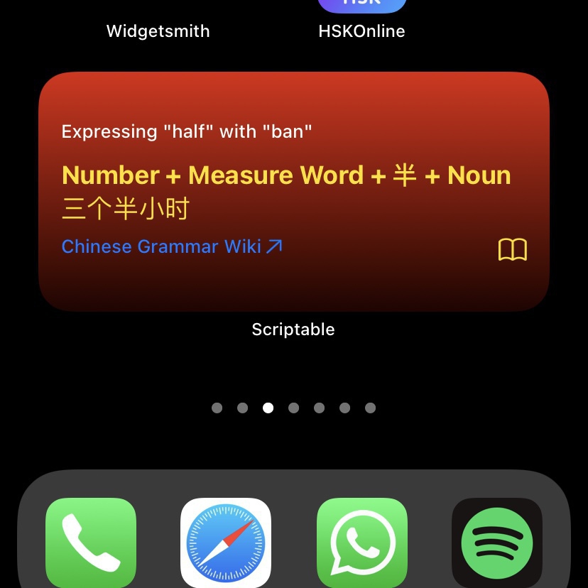 Apple home screen with several apps to learn Chinese and a red widget