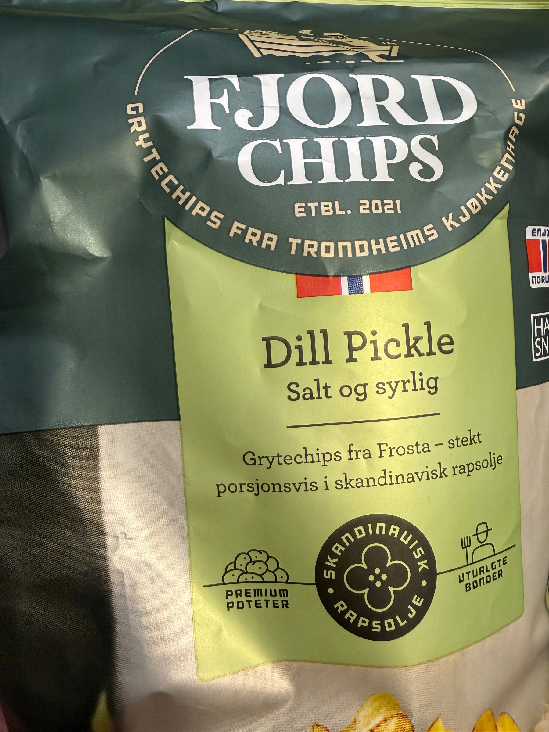 A bag of potato chips. Label says – and sadly the label is correct – ”dill pickle” taste. 